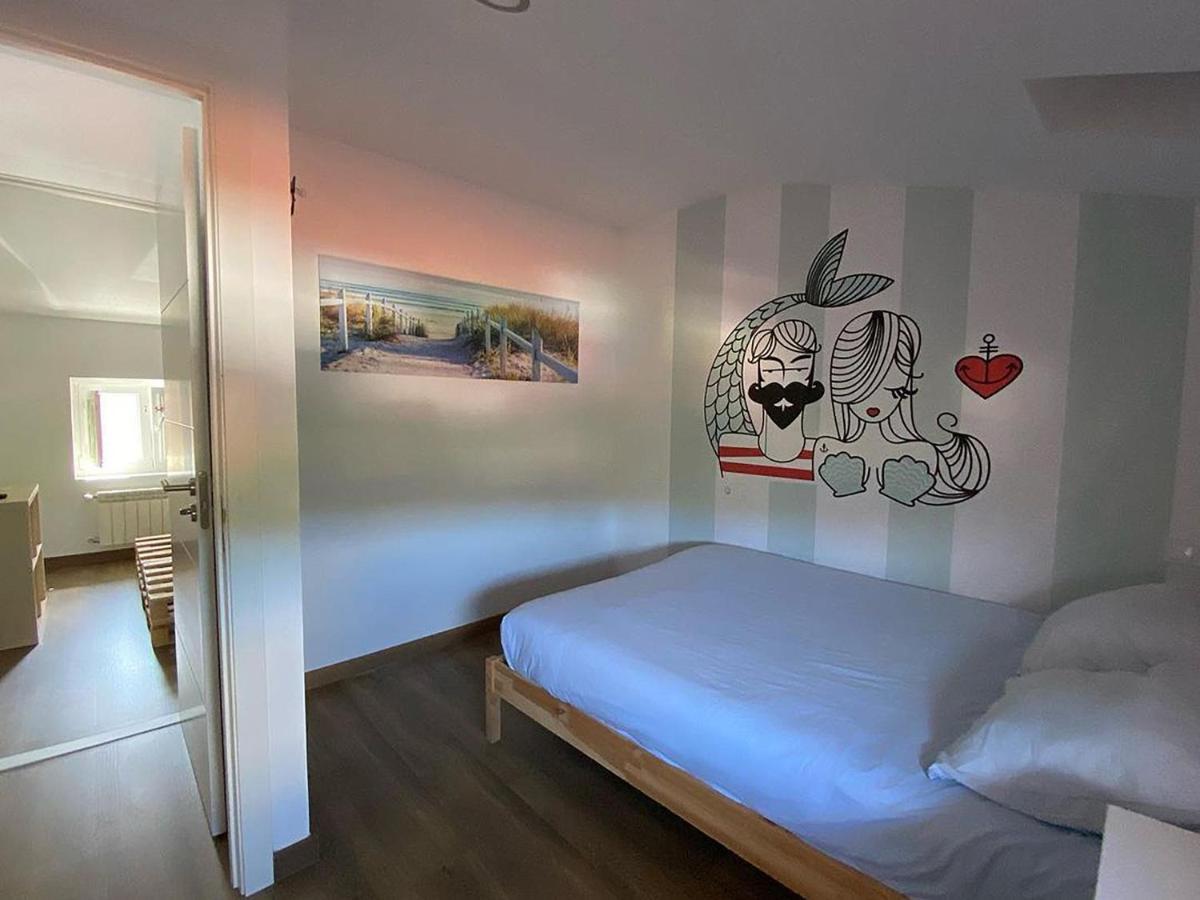 Cocos Surfhouse Hostel San Juan De La Arena Bagian luar foto