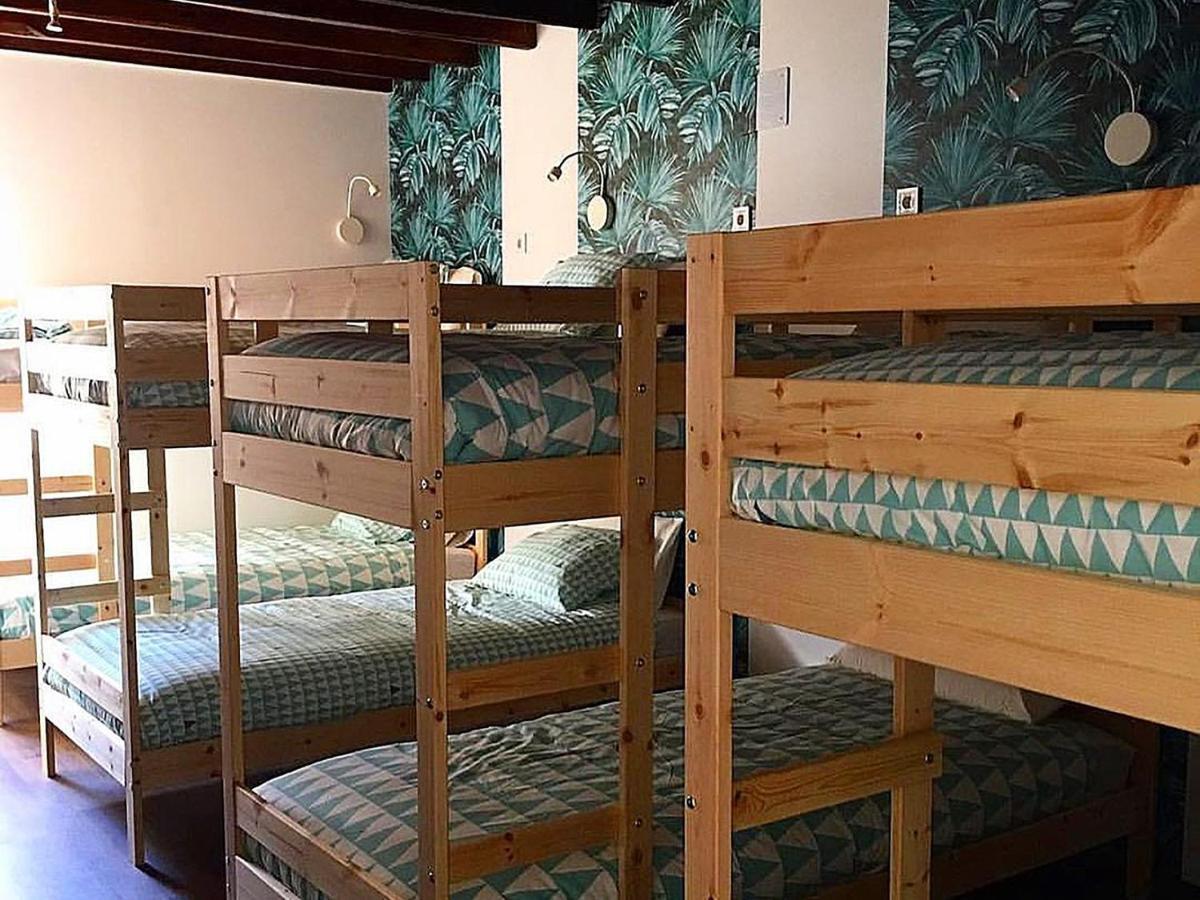 Cocos Surfhouse Hostel San Juan De La Arena Bagian luar foto