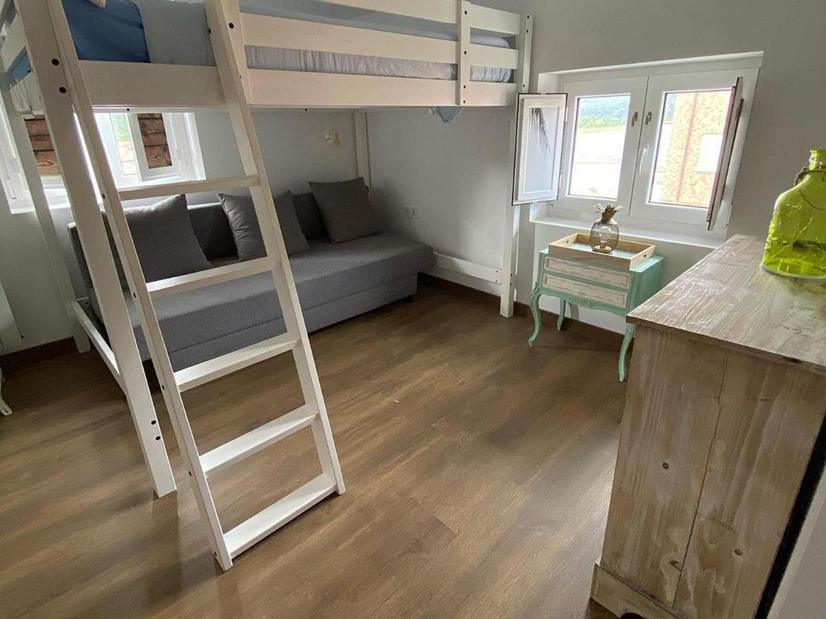 Cocos Surfhouse Hostel San Juan De La Arena Bagian luar foto
