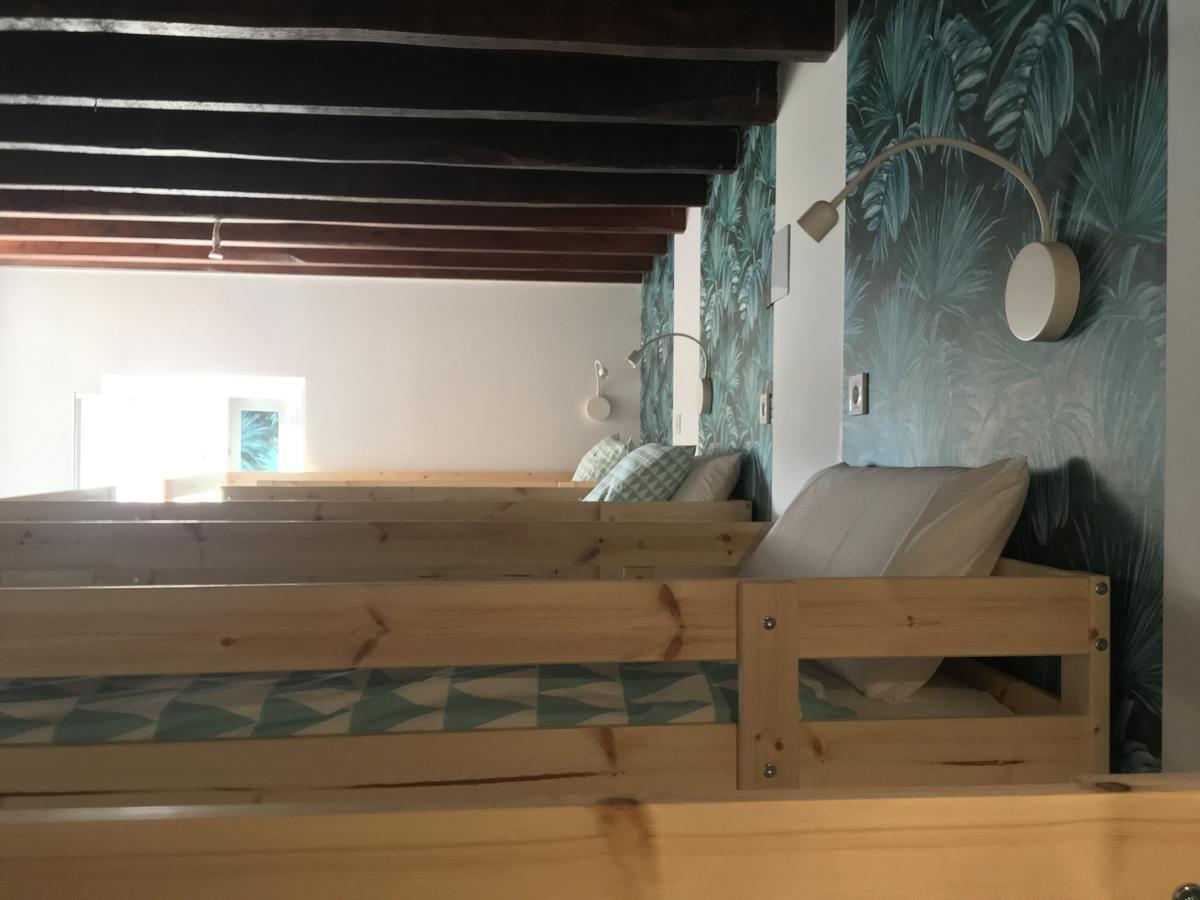 Cocos Surfhouse Hostel San Juan De La Arena Bagian luar foto